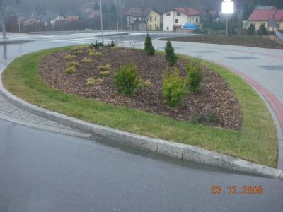 Przebudowa ul. Karbowej w Bielsku-Białej - na zdjęciu fragment drogi, domy oraz zieleń