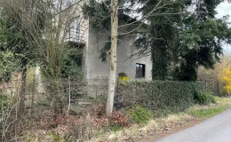 Zdjęcie nieruchomości zabudowanej budynkiem mieszkalnym wolnostojącym przy ul. Botanicznej 5