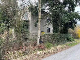 Zdjęcie nieruchomości zabudowanej budynkiem mieszkalnym wolnostojącym przy ul. Botanicznej 5