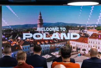 na zdjęciu osoby podczas konferencji