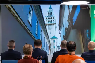 na zdjęciu osoby podczas konferencji