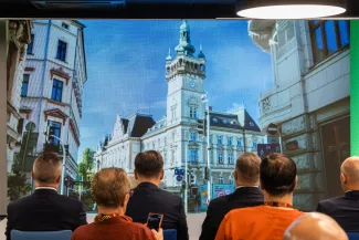 na zdjęciu osoby podczas konferencji